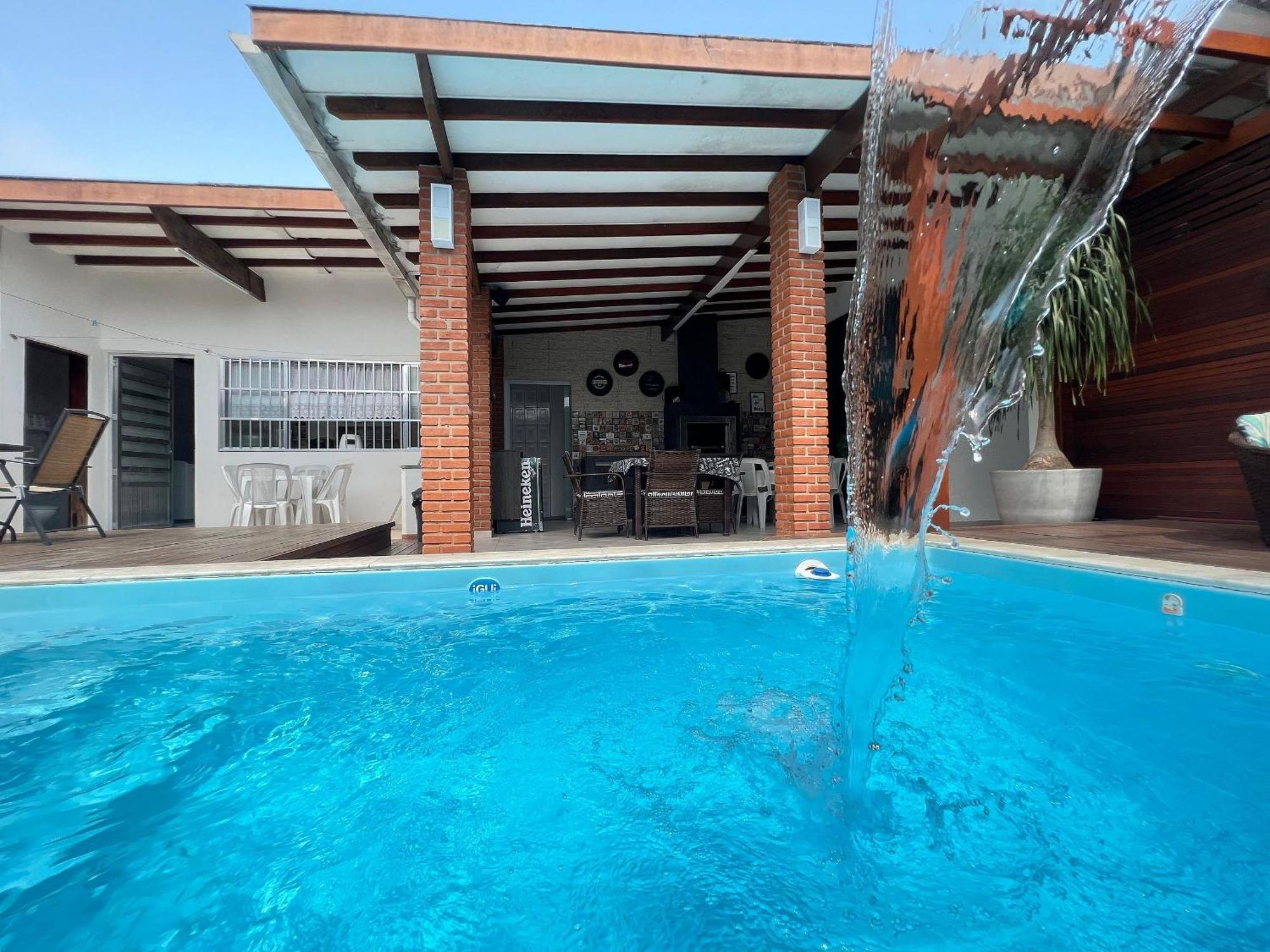 Casa agradável com piscina, a poucos passos da Praia Peruíbe Exterior foto